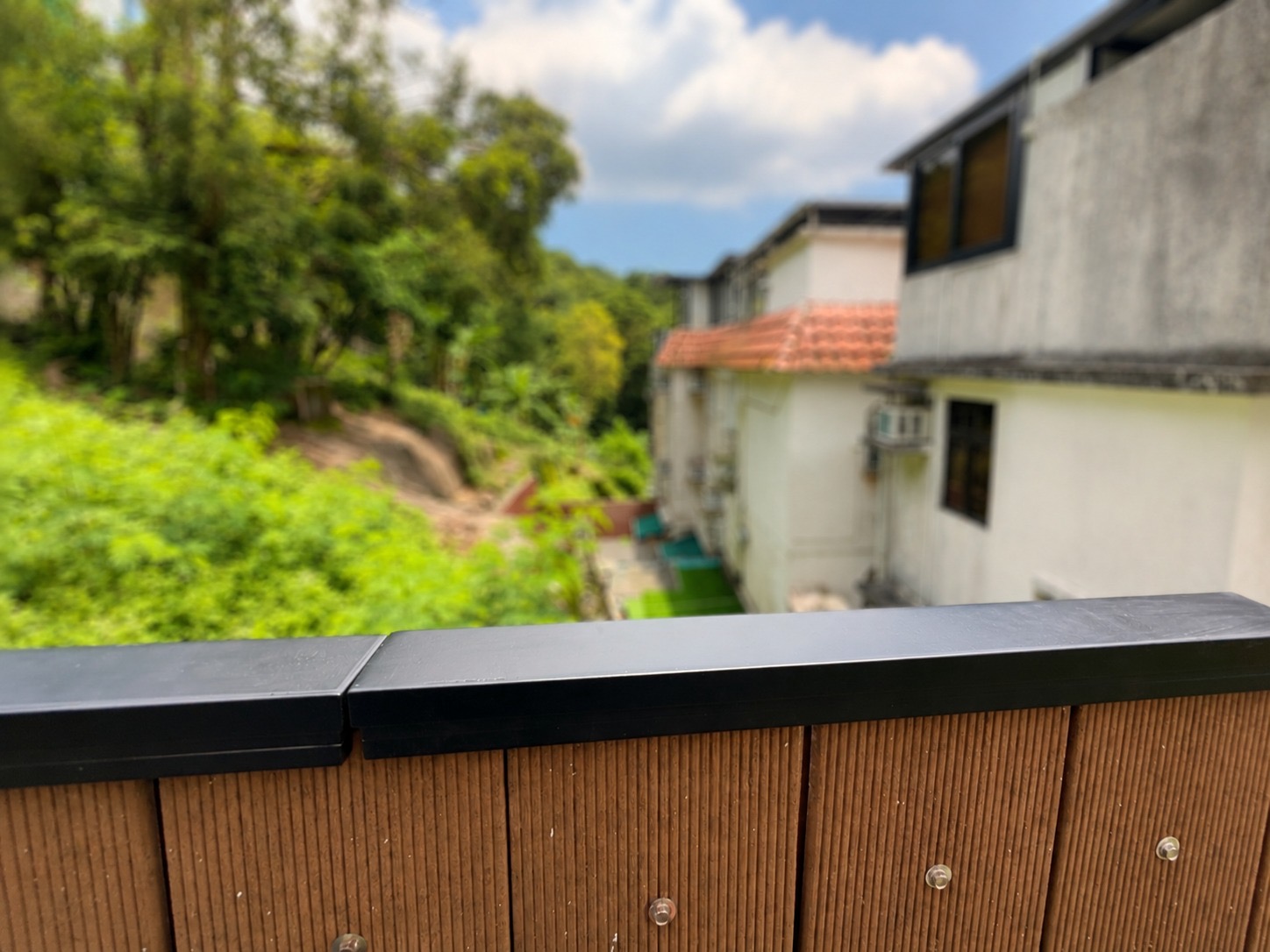 Completed Apeiron Guard fence-top climb detection sensors protecting a timber residential boundary